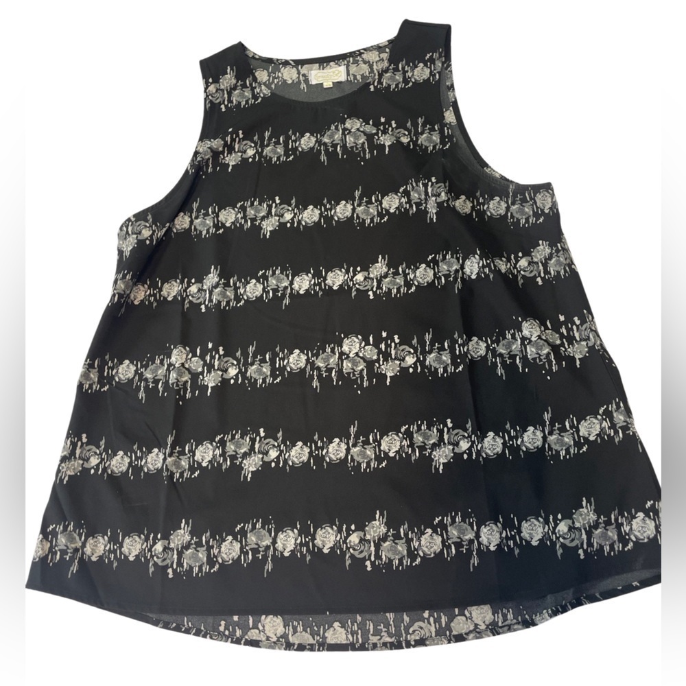 Mudpie black and white rose patterned sleeveless top. Modest neckline and light